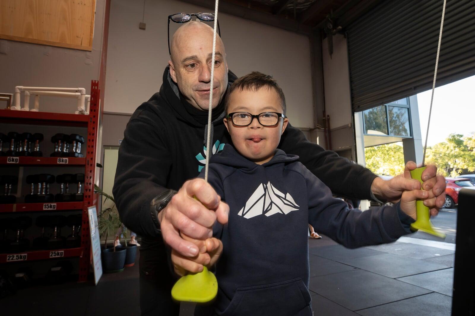Michael with a young student